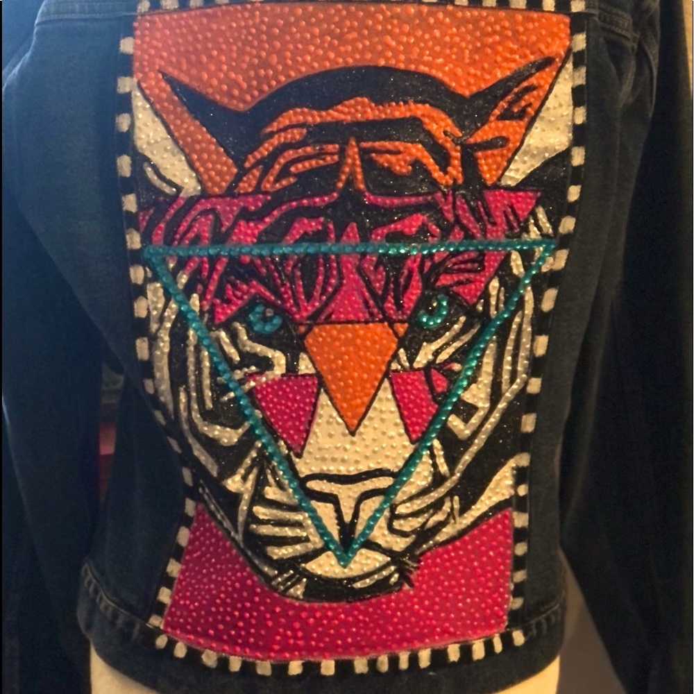 Hand painted tiger on a denim jacket.
